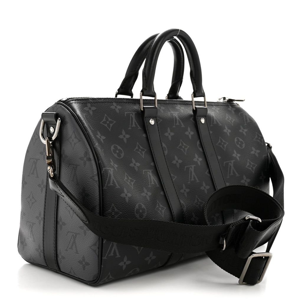MONOGRAM ECLIPSE REVERSE KEEPALL BANDOULIERE 35