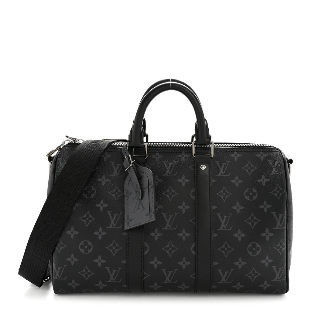 MONOGRAM ECLIPSE REVERSE KEEPALL BANDOULIERE 35