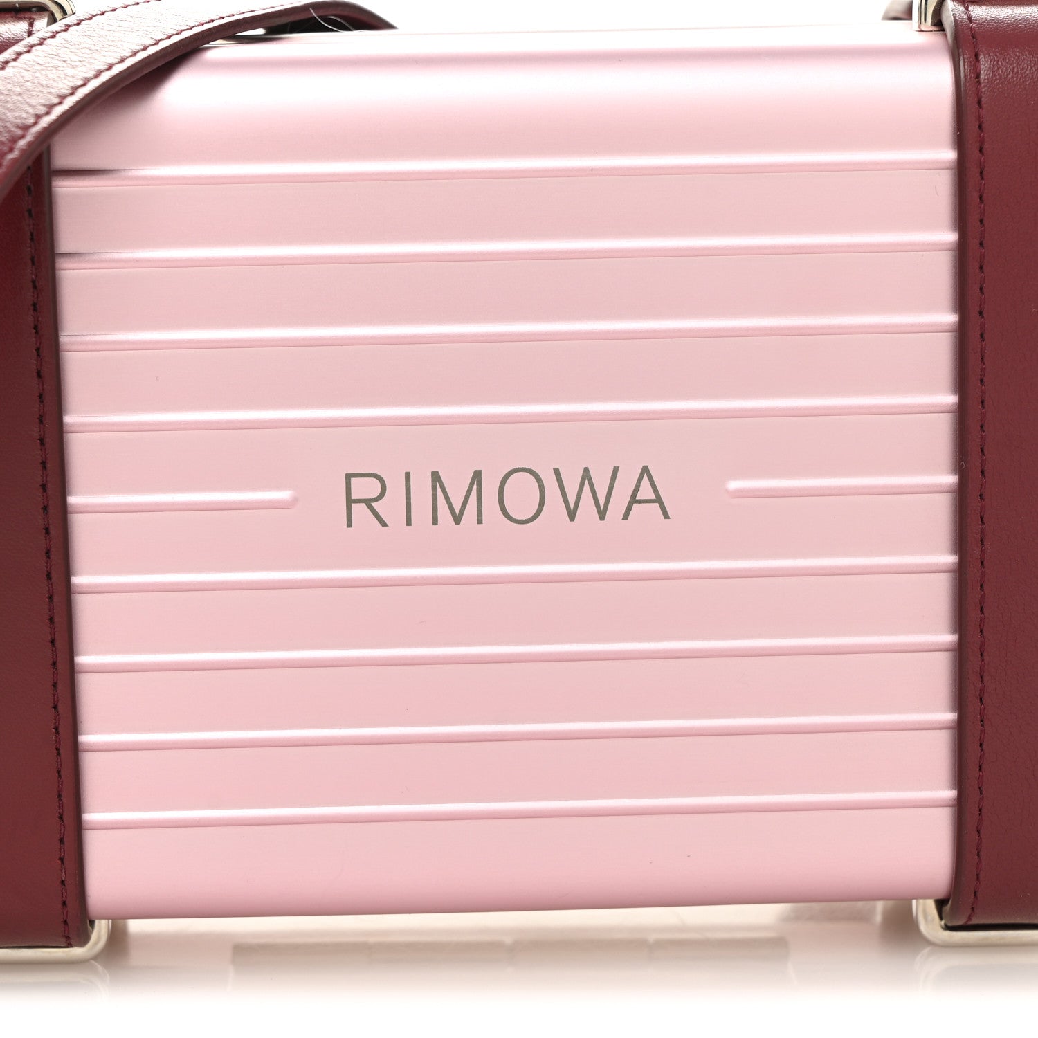 X RIMOWA ALUMINUM PERSONAL CLUTCH ON STRAP ROSE