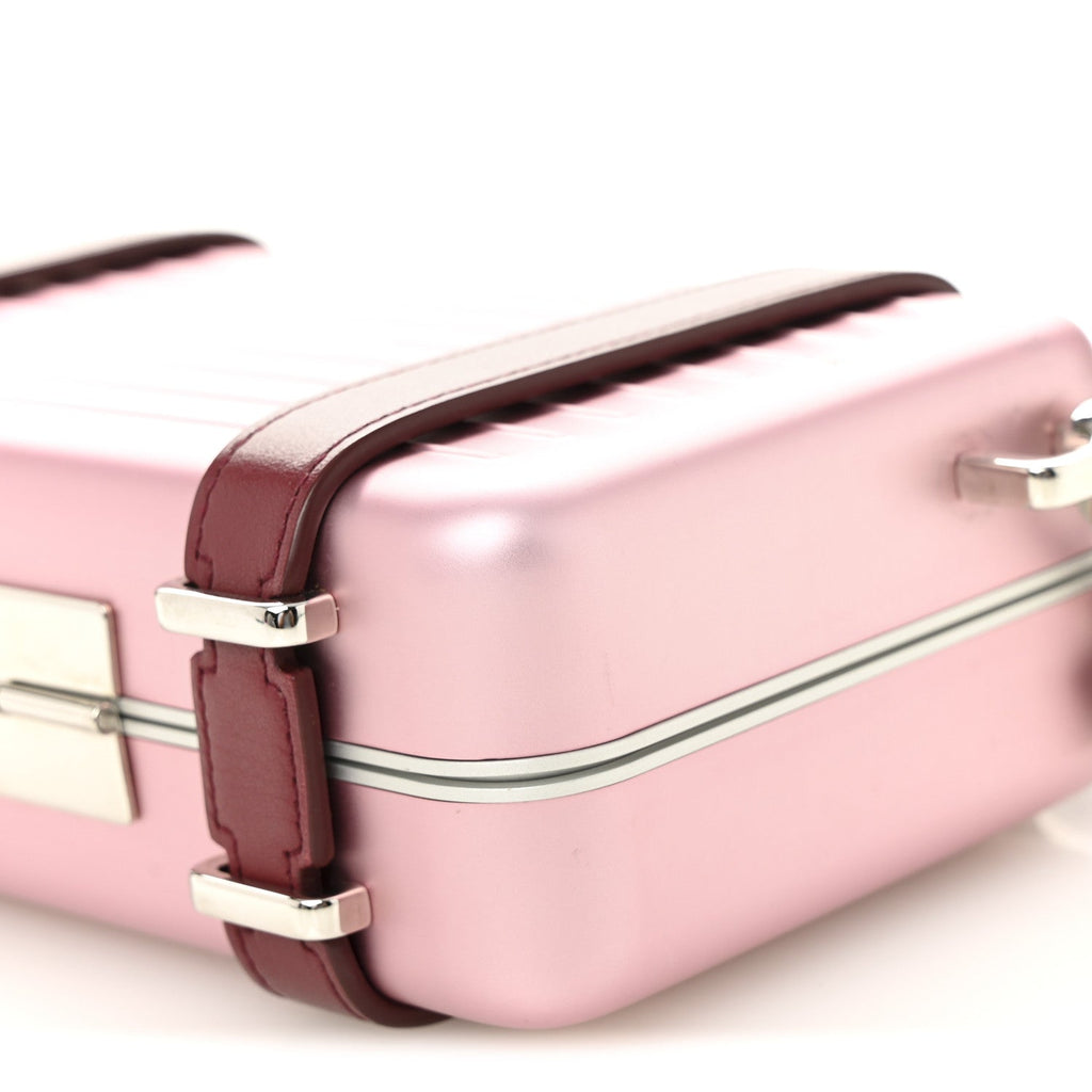 X RIMOWA ALUMINUM PERSONAL CLUTCH ON STRAP ROSE