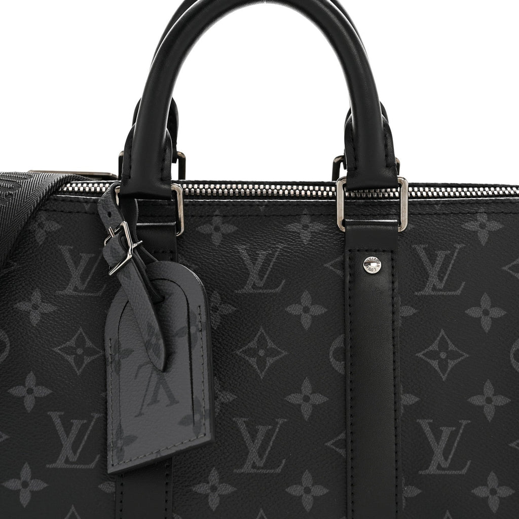 MONOGRAM ECLIPSE REVERSE KEEPALL BANDOULIERE 35