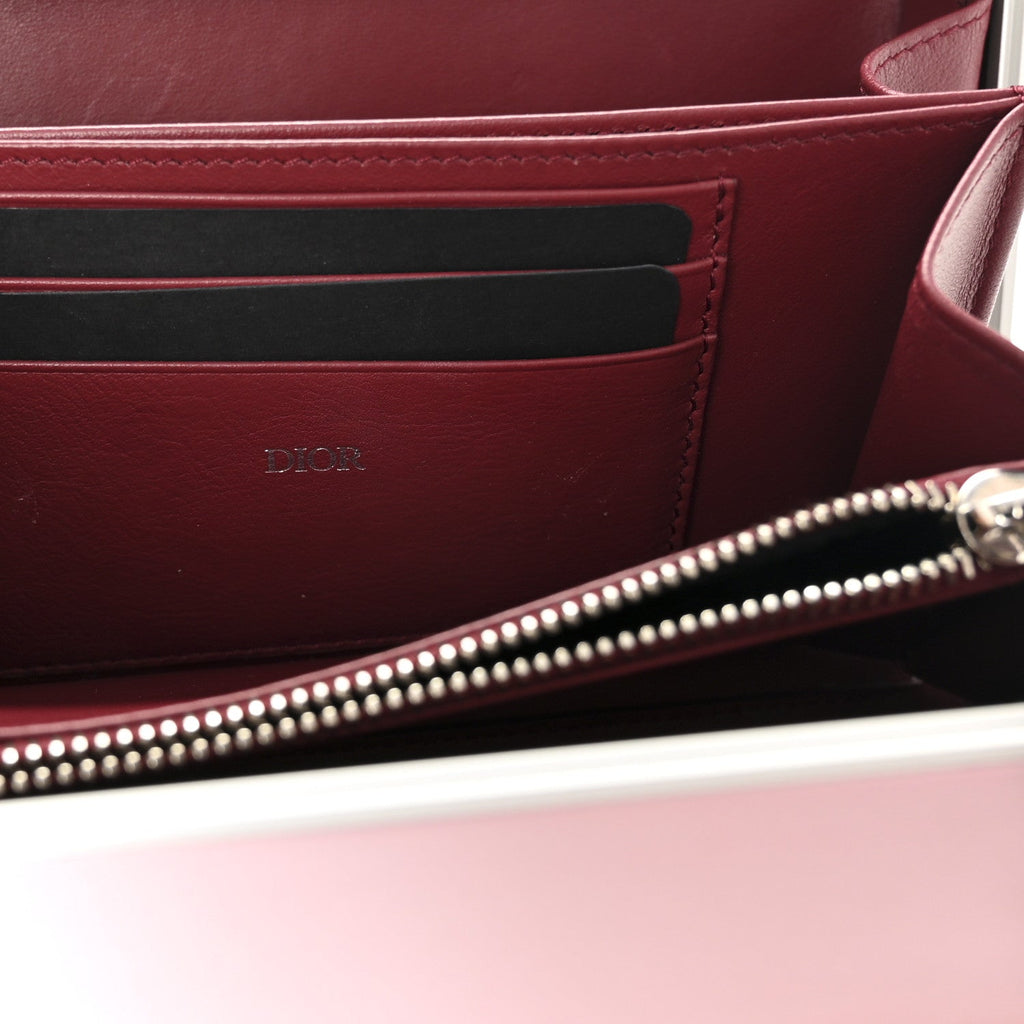 X RIMOWA ALUMINUM PERSONAL CLUTCH ON STRAP ROSE