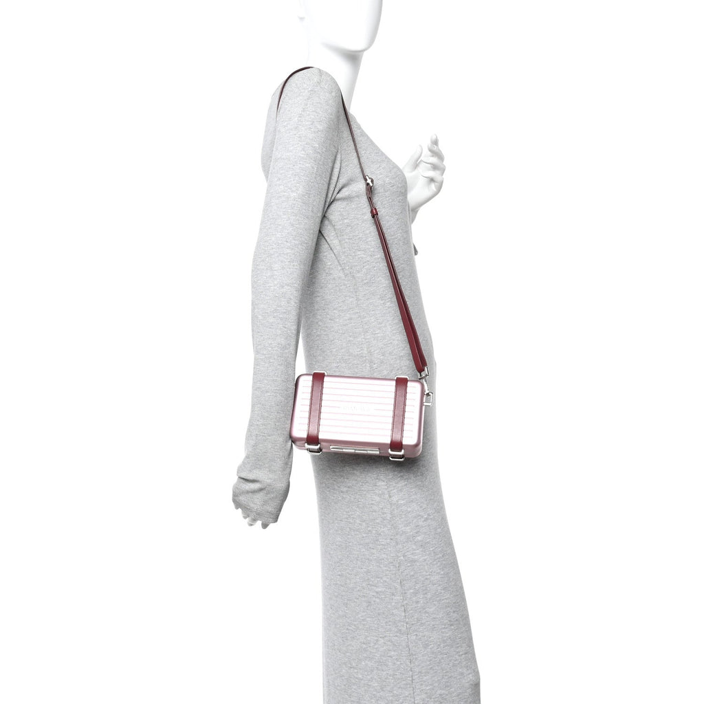 X RIMOWA ALUMINUM PERSONAL CLUTCH ON STRAP ROSE