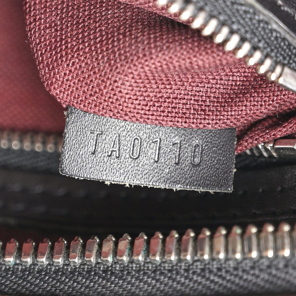 MONOGRAM MACASSAR PORTE-DOCUMENTS VOYAGE GM