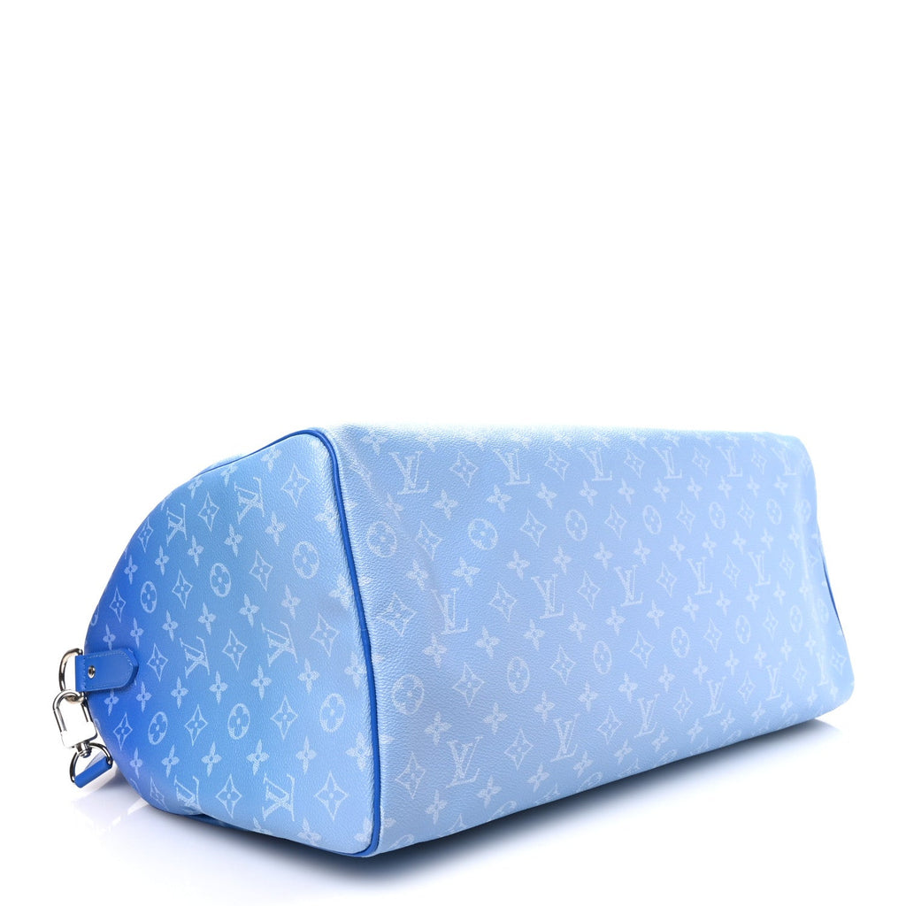 MONOGRAM CLOUDS KEEPALL BANDOULIERE 50 BLUE