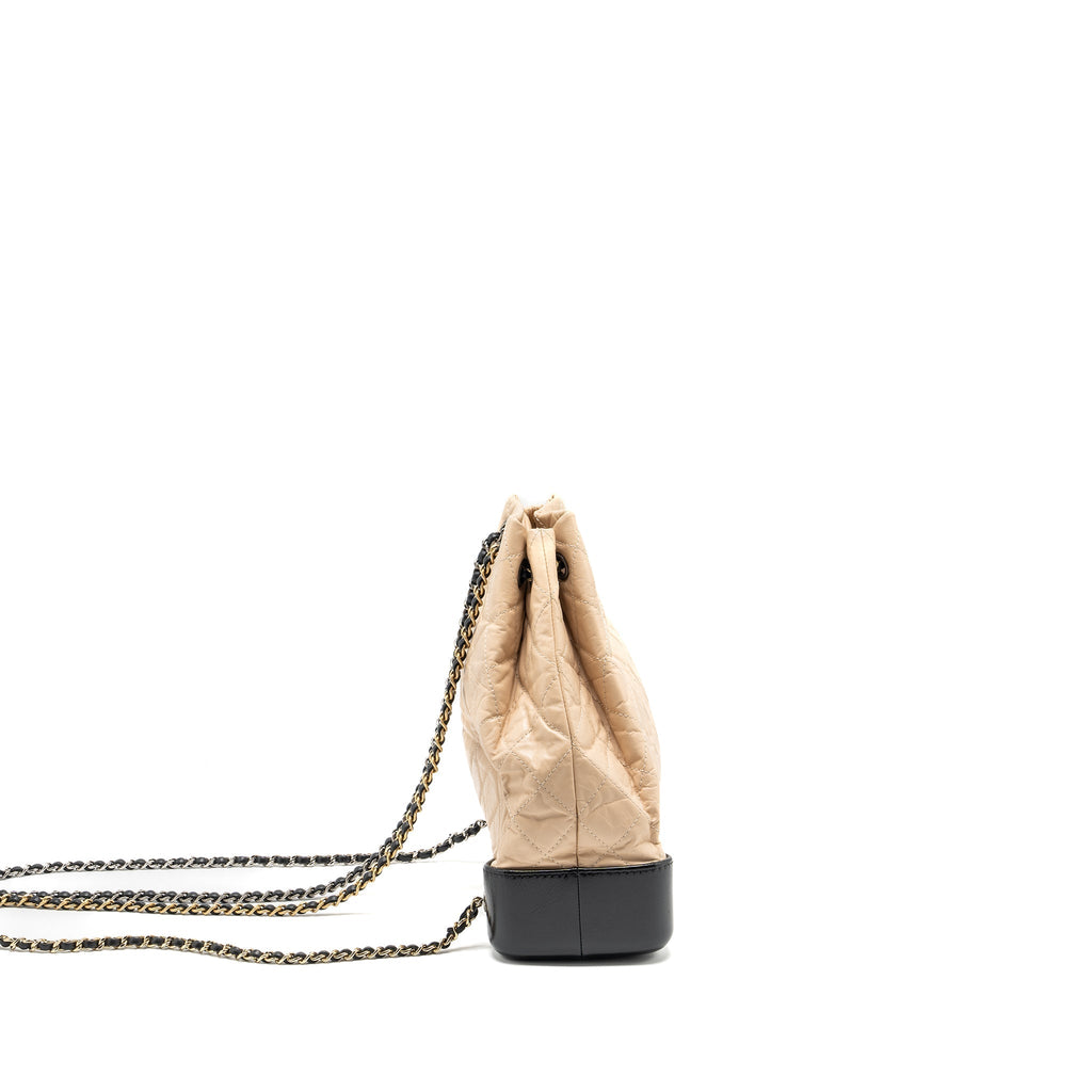 CHANEL MEDIUM GABRIELLE BACKPACK AGED CALFSKIN BEIGE/BLACK MULTICOLOUR HARDWARE