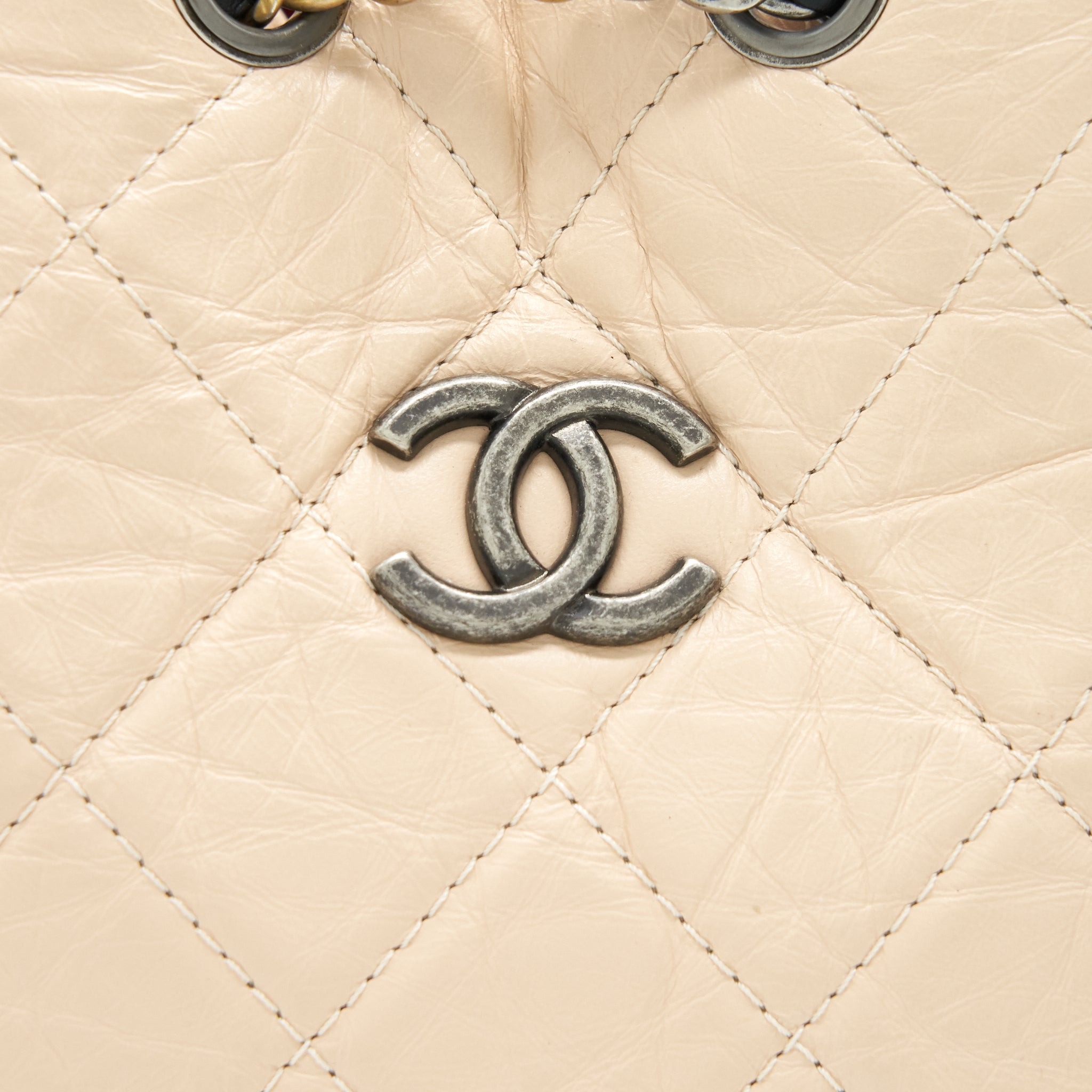 CHANEL GABRIELLE BACKPACK IN AGED CALFSKIN QUILTED LEATHER BEIGE