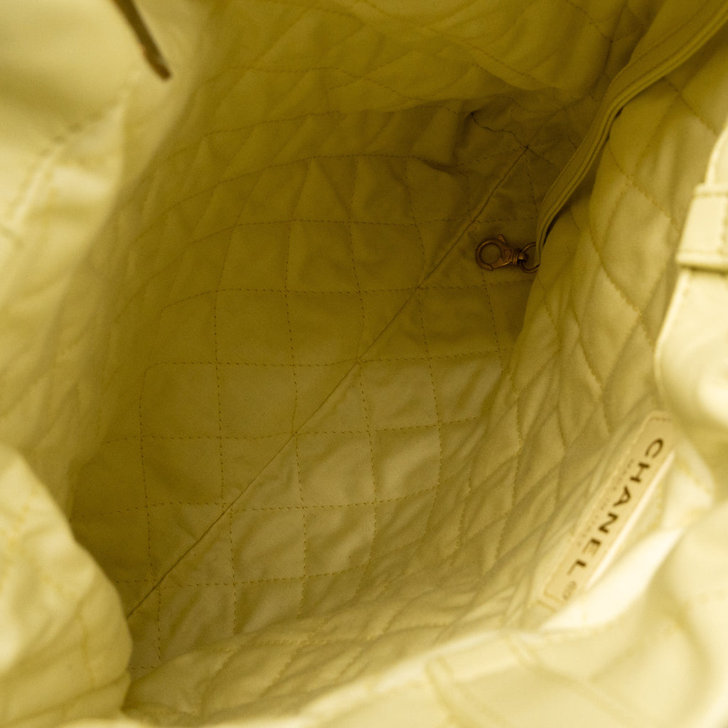 CHANEL 23P SMALL 22 BACKPACK SHINY CALFSKIN LIGHT YELLOW BRUSHED GHW(MICROCHIP)