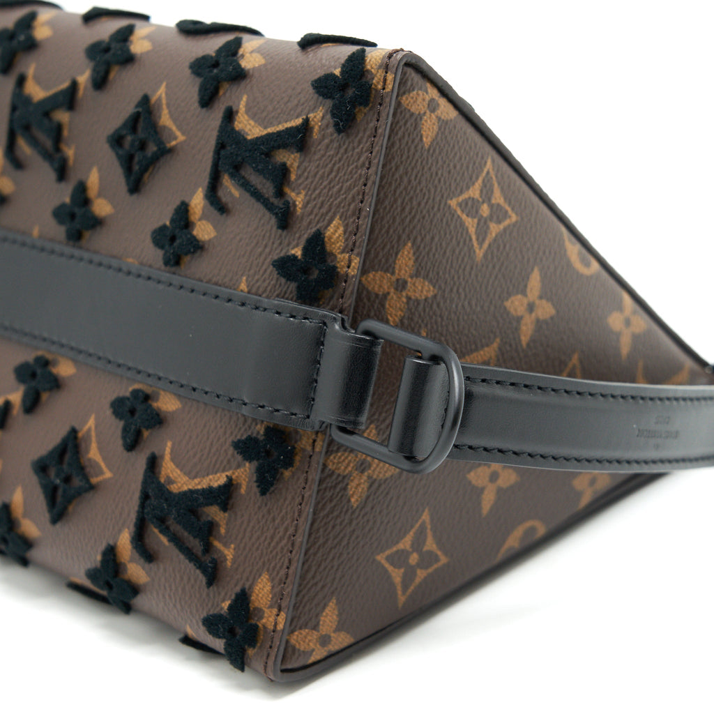 LOUIS VUITTON TRIANGLE MESSENGER BAG
