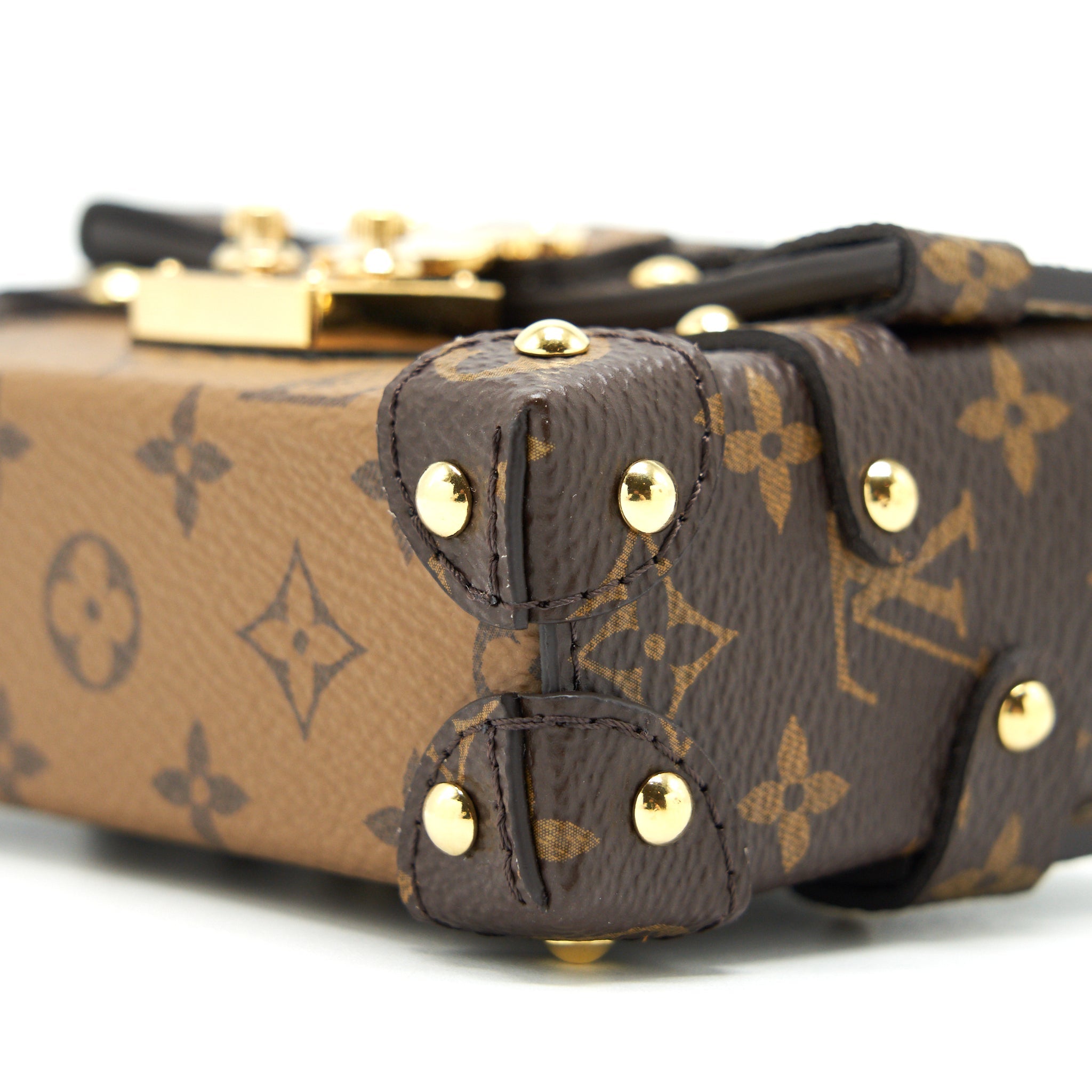 LOUIS VUITTON ESSENTIAL TRUNK WITH CHAIN REVERSE MONOGRAM