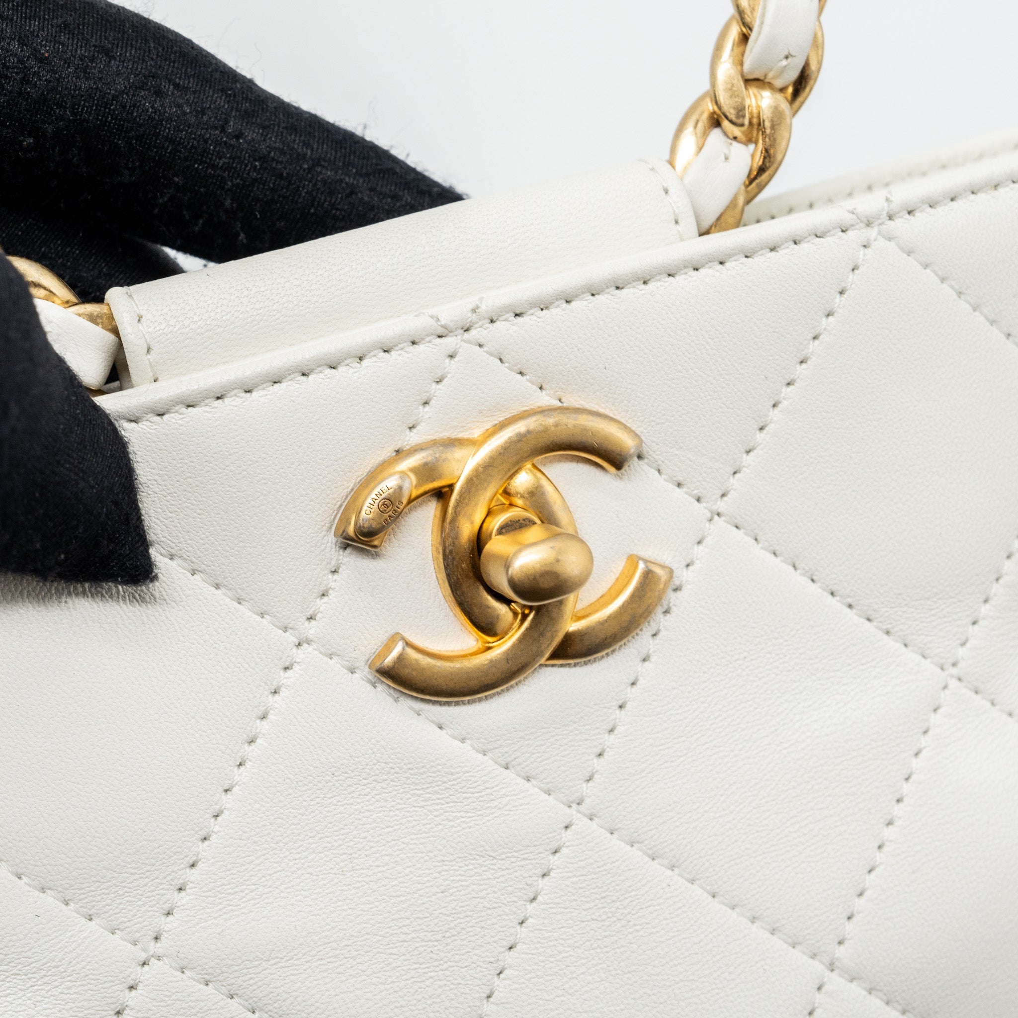 CHANEL ROUND HANDLE BUCKET BACKPACK LAMBSKIN WHITE GHW