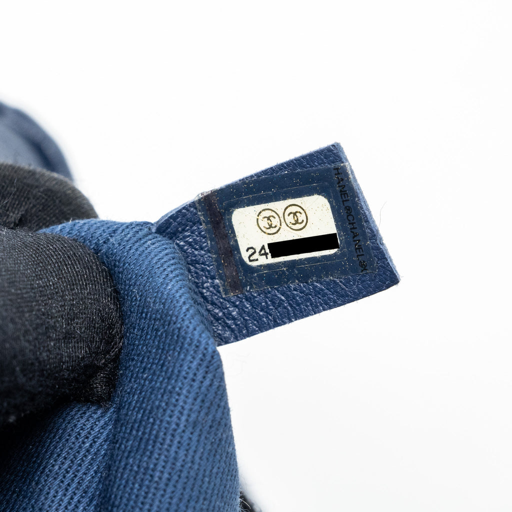 CHANEL DRAWSTRING BACKPACK LAMBSKIN / GRAINED CALFSKIN DARK BLUE LGHW