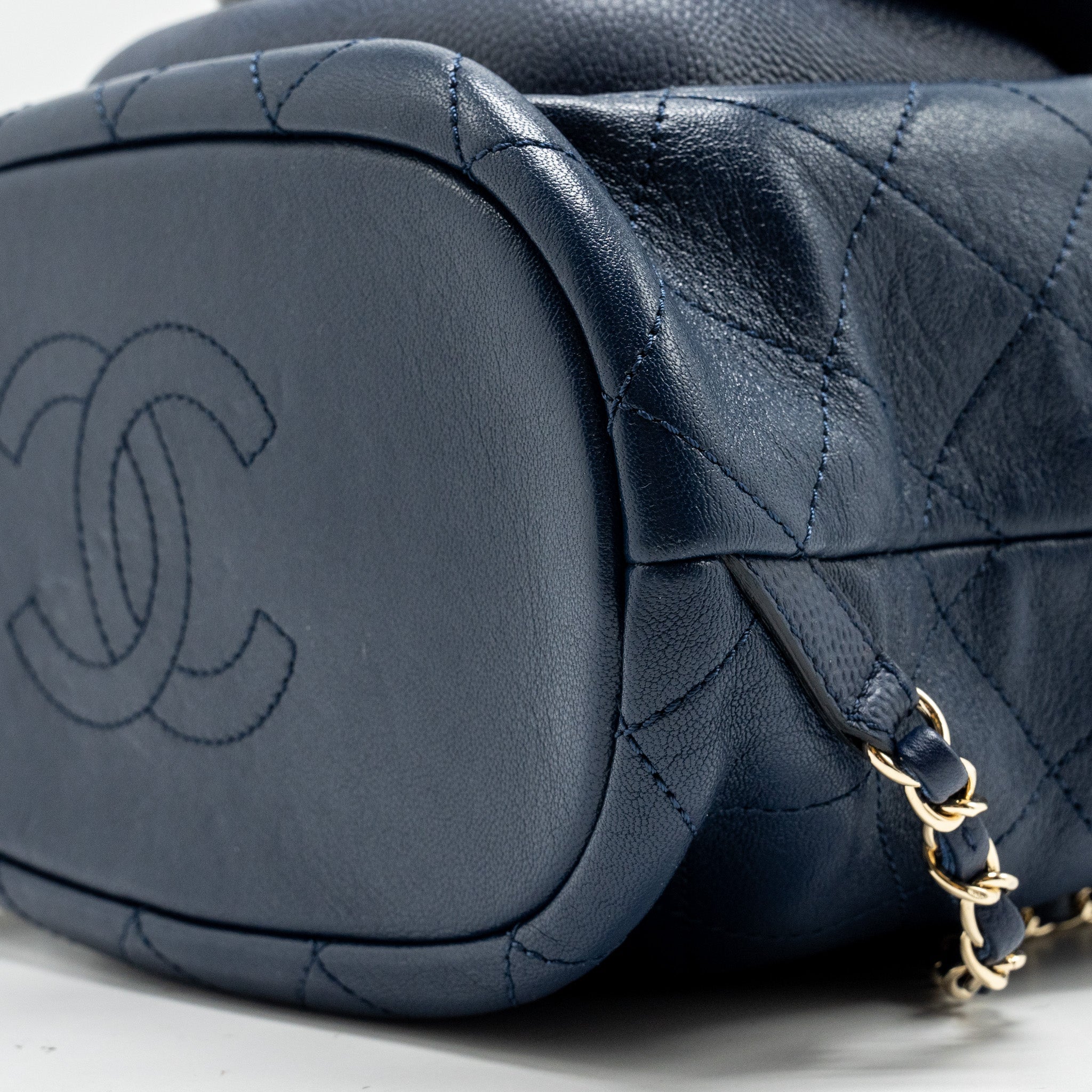 CHANEL DRAWSTRING BACKPACK LAMBSKIN/GRAINED CALFSKIN DARK BLUE LGHW