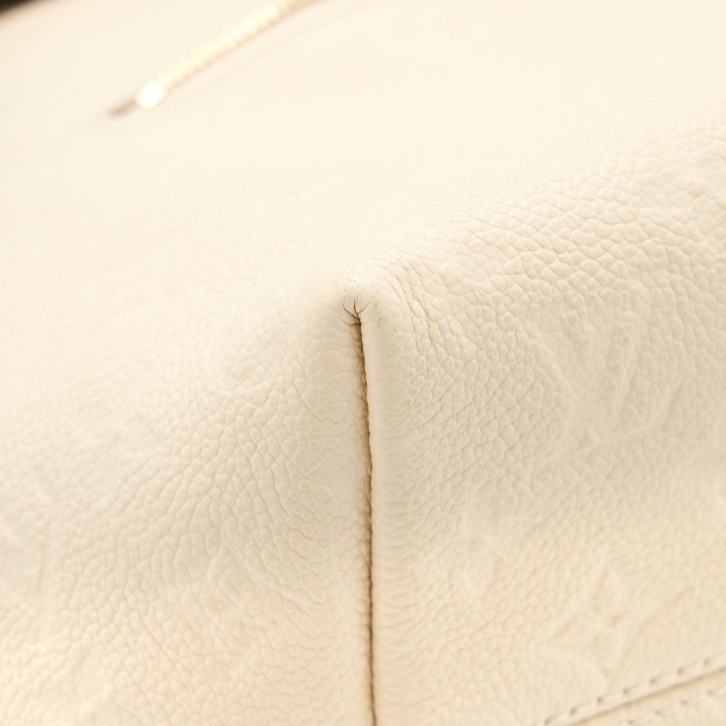 LOUIS VUITTON MONTSOURIS BACKPACK MONOGRAM EMPREINTE CREAM GHW