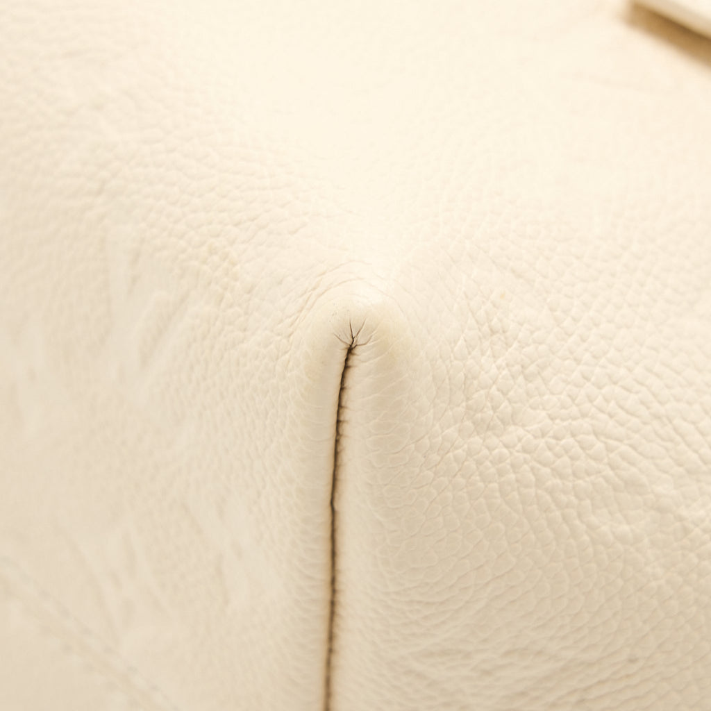 LOUIS VUITTON MONTSOURIS BACKPACK MONOGRAM EMPREINTE CREAM GHW