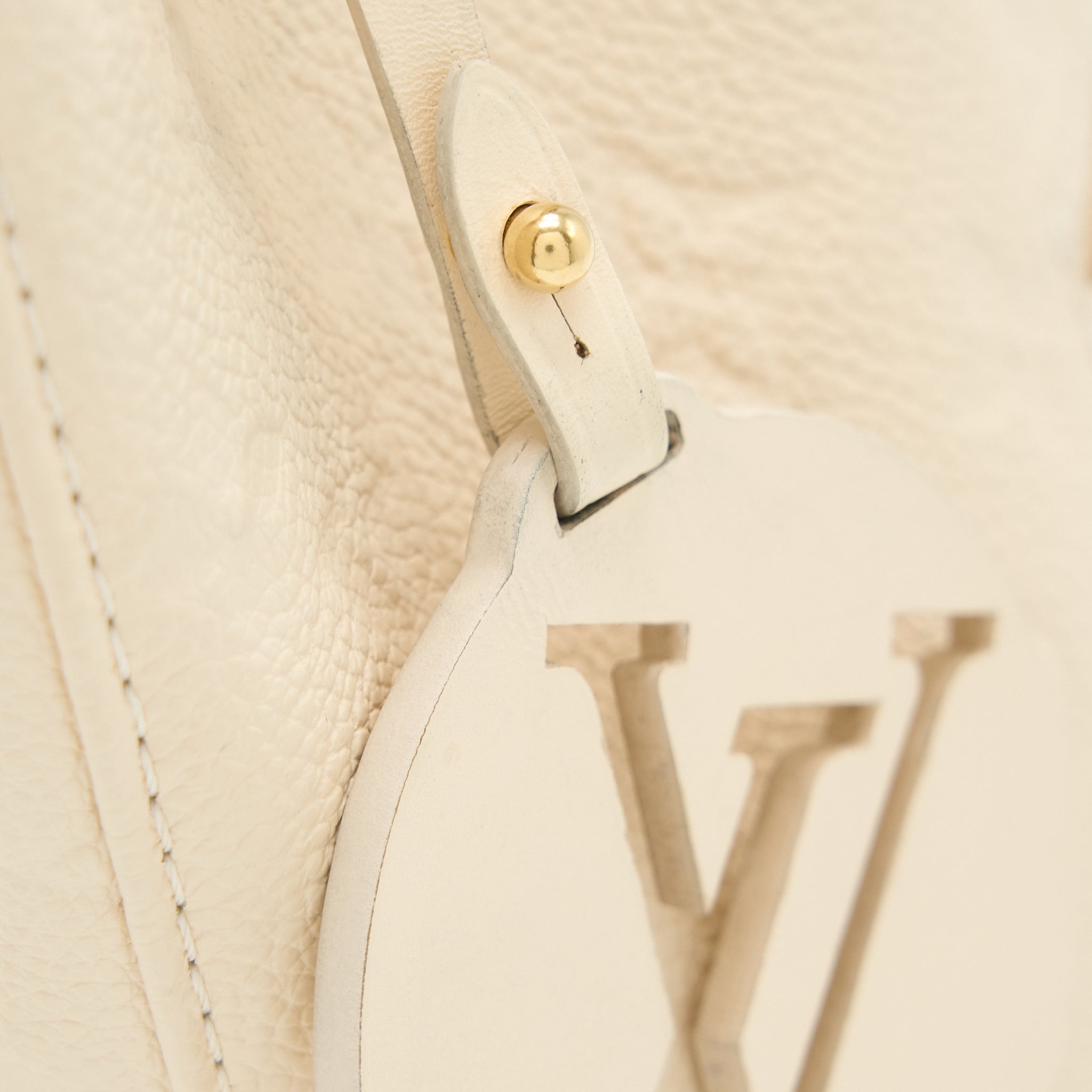 LOUIS VUITTON MONTSOURIS BACKPACK MONOGRAM EMPREINTE CREAM GHW