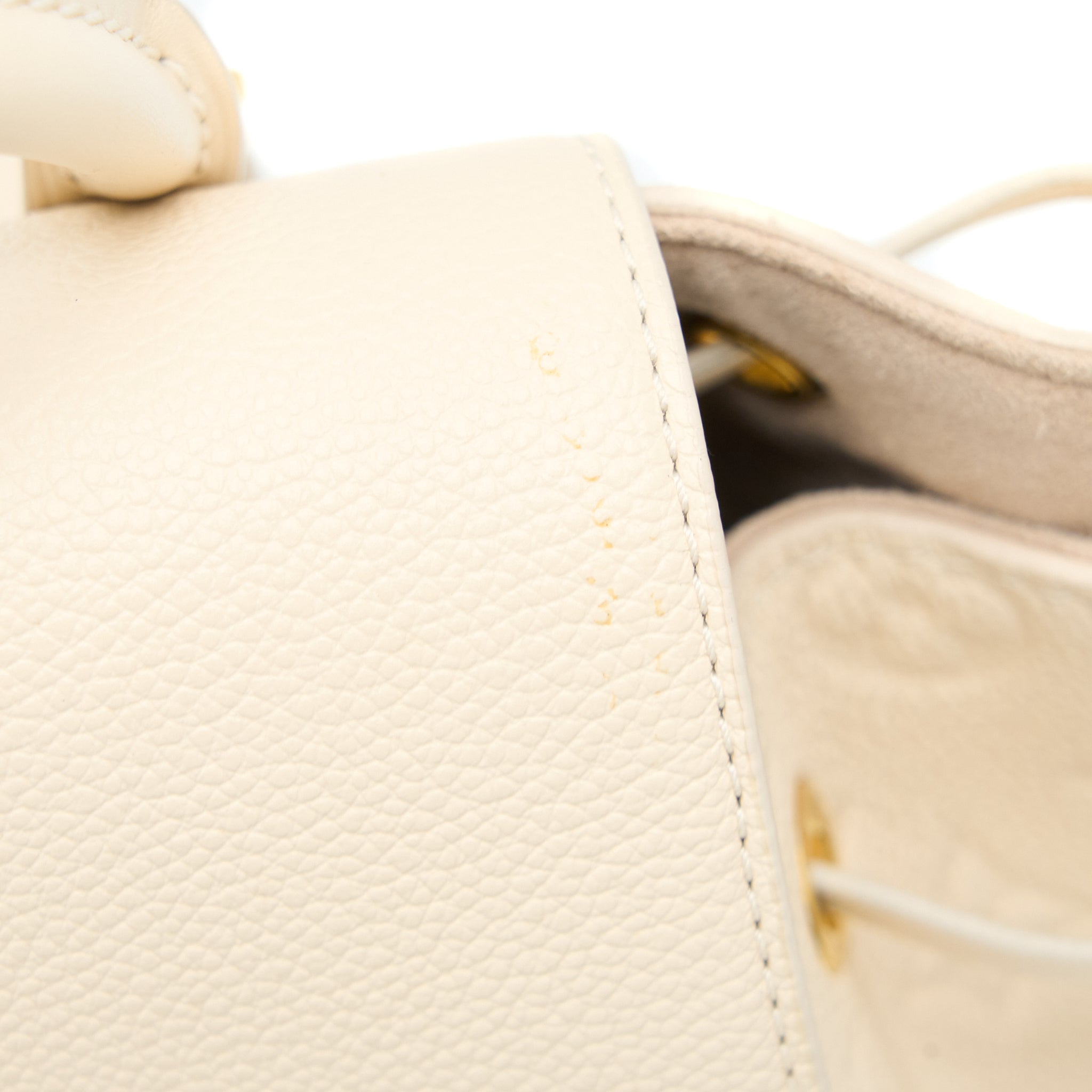 LOUIS VUITTON MONTSOURIS BACKPACK MONOGRAM EMPREINTE CREAM GHW