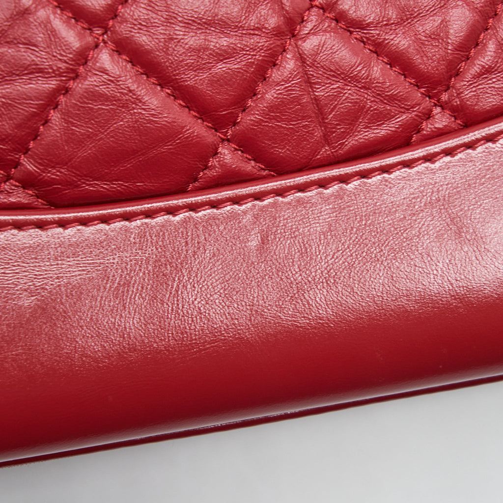 CHANEL SMALL GABRIELLE BACKPACK AGED CALFSKIN RED WITH RUTHENIUM GOLD/SLIVER HARDWARE