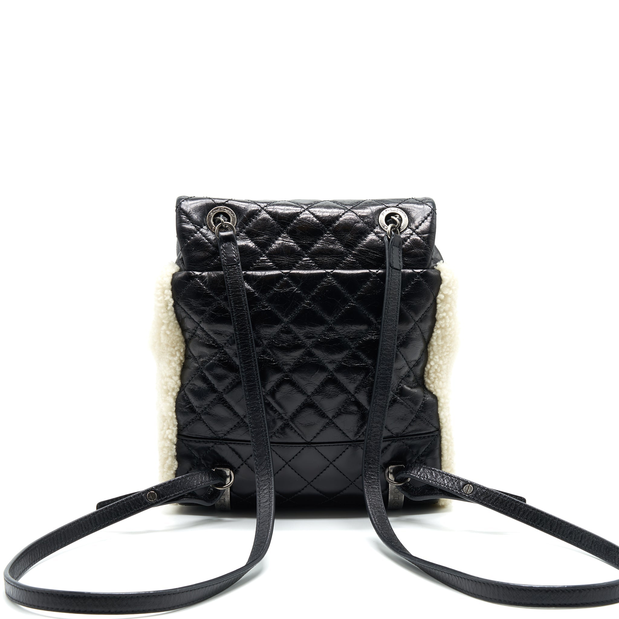 CHANEL MOUNTAIN SMALL BACKPACK SHEARLING WITH QUILTED CALFSKIN RUTHENIUM HARDWARE