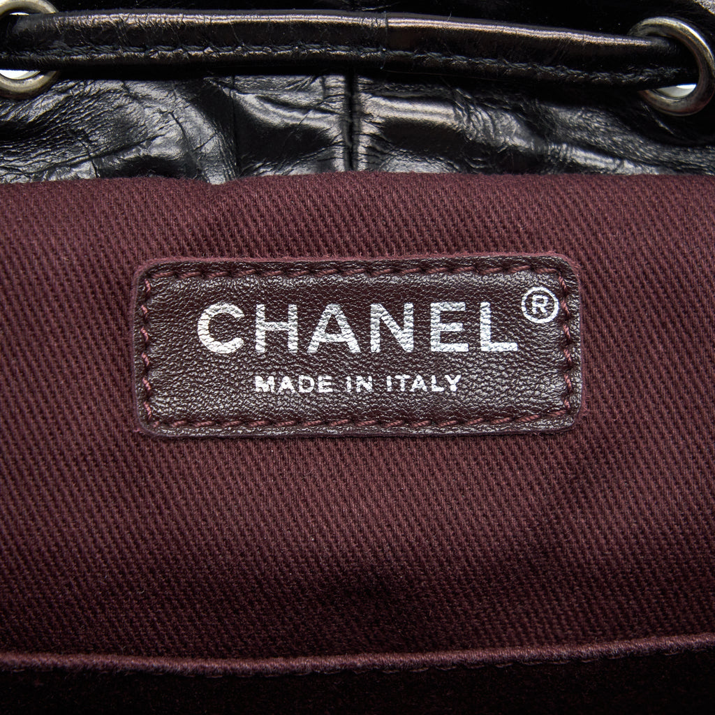 CHANEL MOUNTAIN SMALL BACKPACK SHEARLING WITH QUILTED CALFSKIN RUTHENIUM HARDWARE