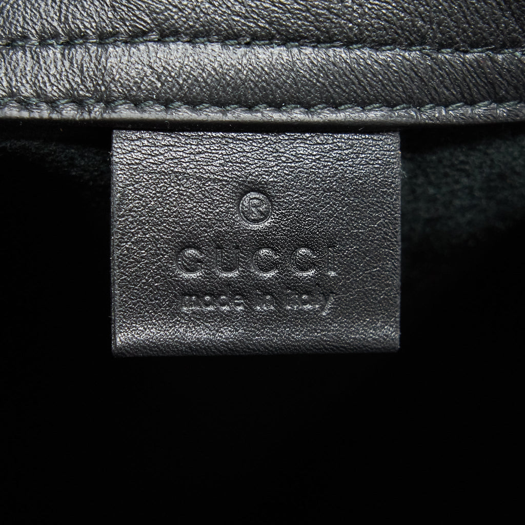 GUCCI LOGO PRINTED DRAWSTRING BACKPACK BLACK