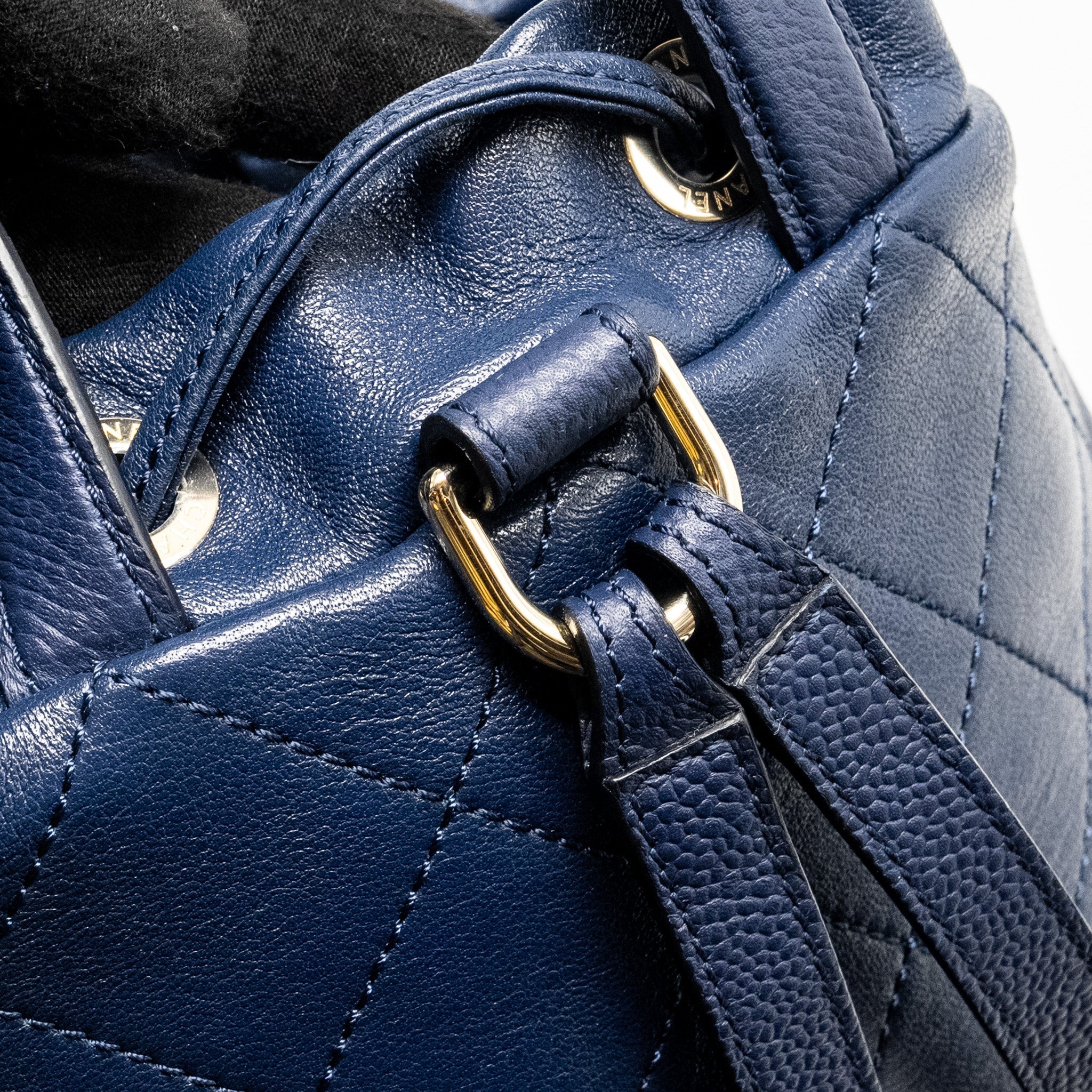 CHANEL DRAWSTRING BACKPACK LAMBSKIN/GRAINED CALFSKIN DARK BLUE LGHW