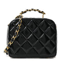 PATENT QUILTED VANITY CASE BLACK