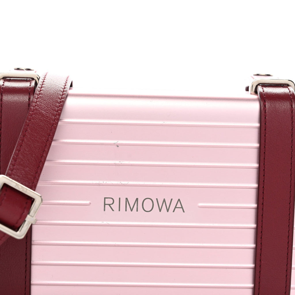 X RIMOWA Aluminum Personal Clutch On Strap Rose