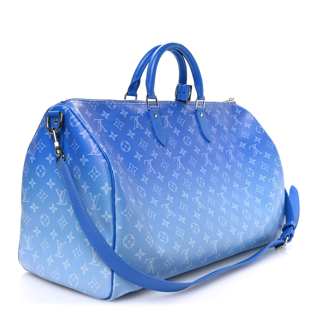 MONOGRAM CLOUDS KEEPALL BANDOULIERE 50 BLUE