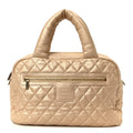METALLIC LAMBSKIN QUILTED COCO COCOON BOWLER LIGHT GOLD