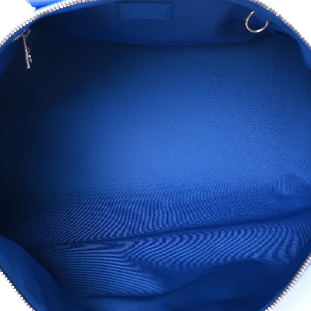 MONOGRAM CLOUDS KEEPALL BANDOULIERE 50 BLUE