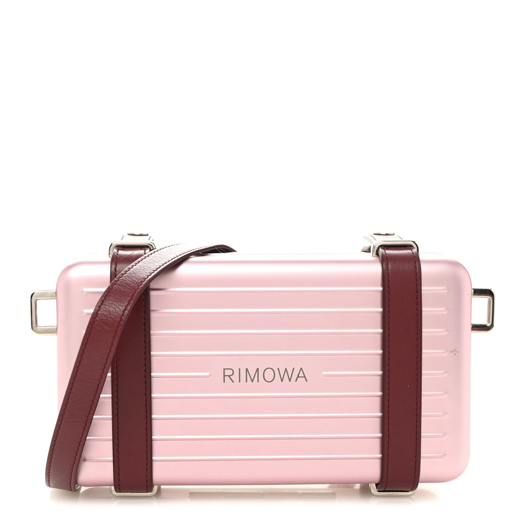 X RIMOWA ALUMINUM PERSONAL CLUTCH ON STRAP ROSE